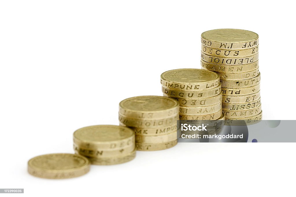 チャートの硬貨 - 1ポンド硬貨のロイヤリティフリーストックフォト