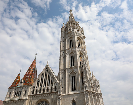 high bell tower of Matthias Church in Budapest on the Hungarian hill