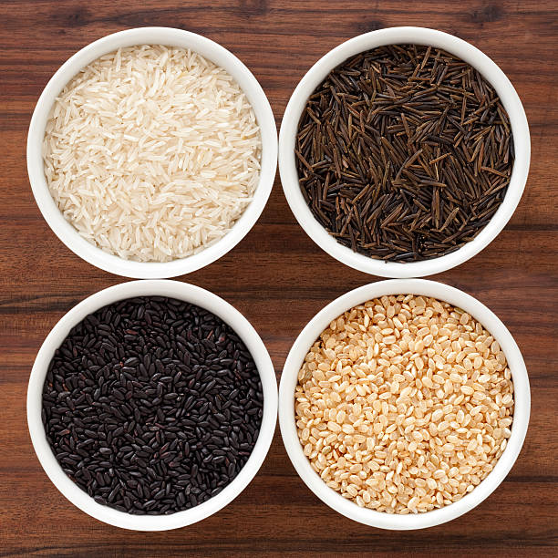 variedades de arroz - dishware brown rice rice variation fotografías e imágenes de stock