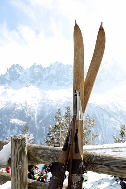 Vintage skis with Mont Blanc Massif behind stock photo