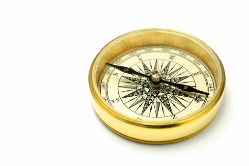 Golden compass against isolated white background.Similar images -