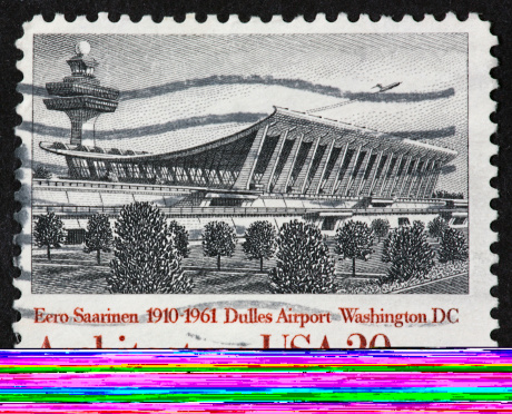 postage stamp honoring the architect Eero Saarinen for his design of the terminal at Dulles Airport in Washington DC.