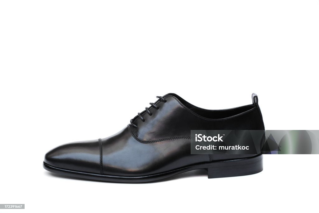 Black Leather Shoe on white Adult Stock Photo