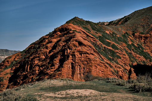 Red rocks of south Tien Shan in autumn. Jeti Oguz, Issyk-Kul region, Kyrgyzstan