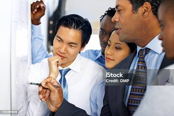 Architects Working Together On New Building Plans Stock Photo - Download Image Now - Active Seniors, Adult, African Ethnicity