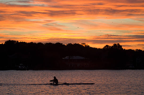 Rower at dawn A senior athlete training at dawn. chestertown stock pictures, royalty-free photos & images