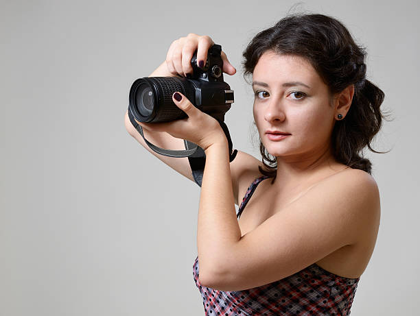 istock Pretty woman photographing 172392238