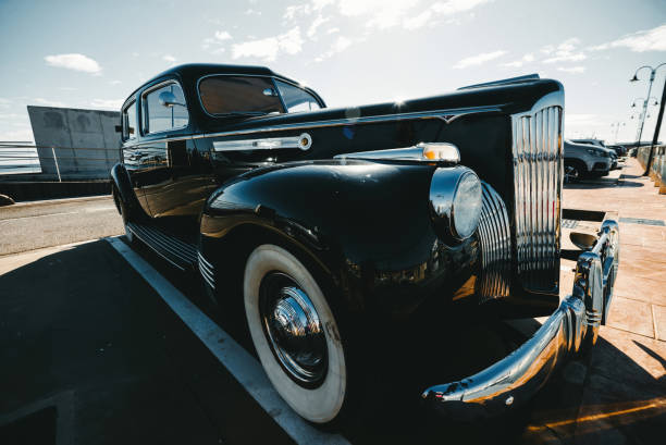 istock 40s Classic Car. Black car white wheels 1723922939