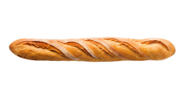 Baguette Loaf of French Bread, Baked Food Isolated on White "Subject: A baguette, a French crusty bread, isolated on a white background" loaf of bread stock pictures, royalty-free photos & images
