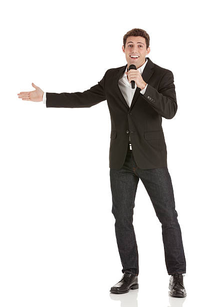 Businessman speaking into a microphone