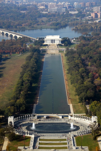 Aerial View of Lincoln Memorial and WWII Memorial in Washington D.C. The river in the background is the Potomac River and the bridge is the Memorial Bridge connecting DC and Arlington Virginia.
