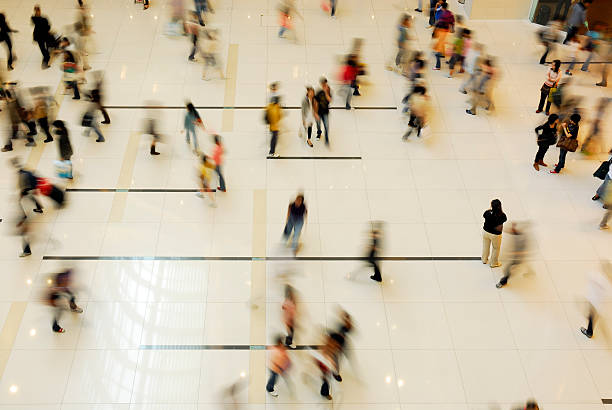 istock A shopping mall filled with people 172393602