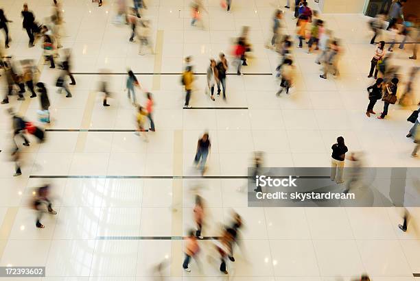 A Shopping Mall Filled With People Stock Photo - Download Image Now - Crowd of People, Shopping Mall, Architecture