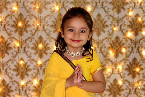 Portrait of little Indian girl dressed up as Radha on Krishna Janmashtami festival