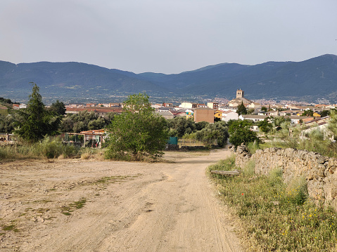 Town in Avila province in the center of Spain in a cloudy day
