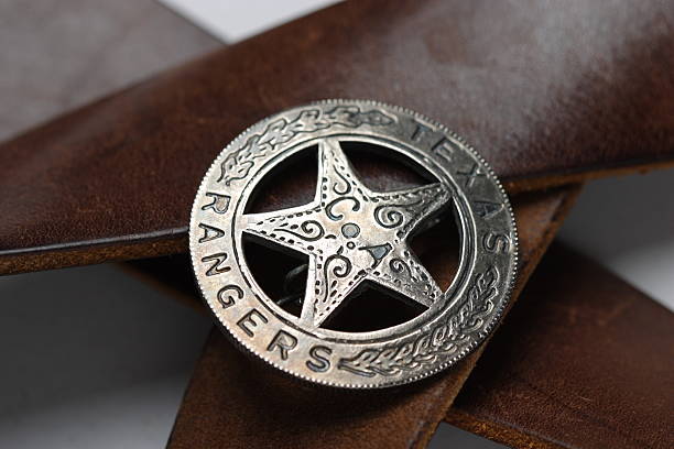 Original Texas Rangers Star pressed from a Mexican coin on a brown leather belt