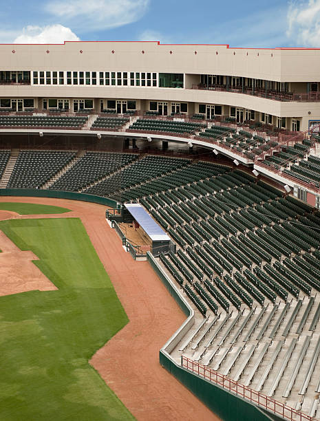 Empty Ballpark Empty bleachers in a baseball park baseball stadium chairs stock pictures, royalty-free photos & images