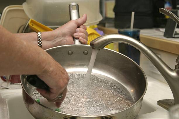 Doing the Dishes stock photo