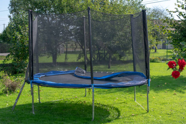 istock Children's garden trampoline with safety net 1723978883