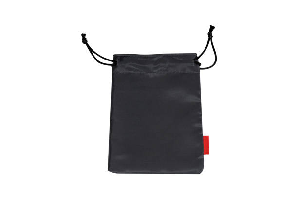 istock Small dark gray nylon bag isolated on white background. 1723979410