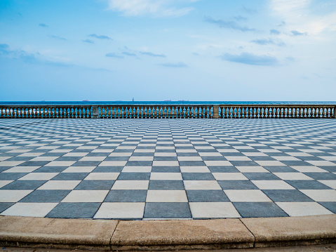 Stunning view of Terrazza Mascagni, picturesque belvedere terrace with a paved checkerboard surface, Livorno, Tuscany, Italy