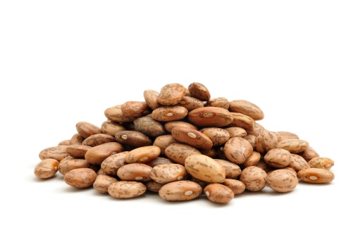 A close up shot of Pinto Beans isolated on a white background.