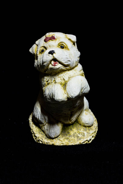 istock dog clay isolated on black 1723992066