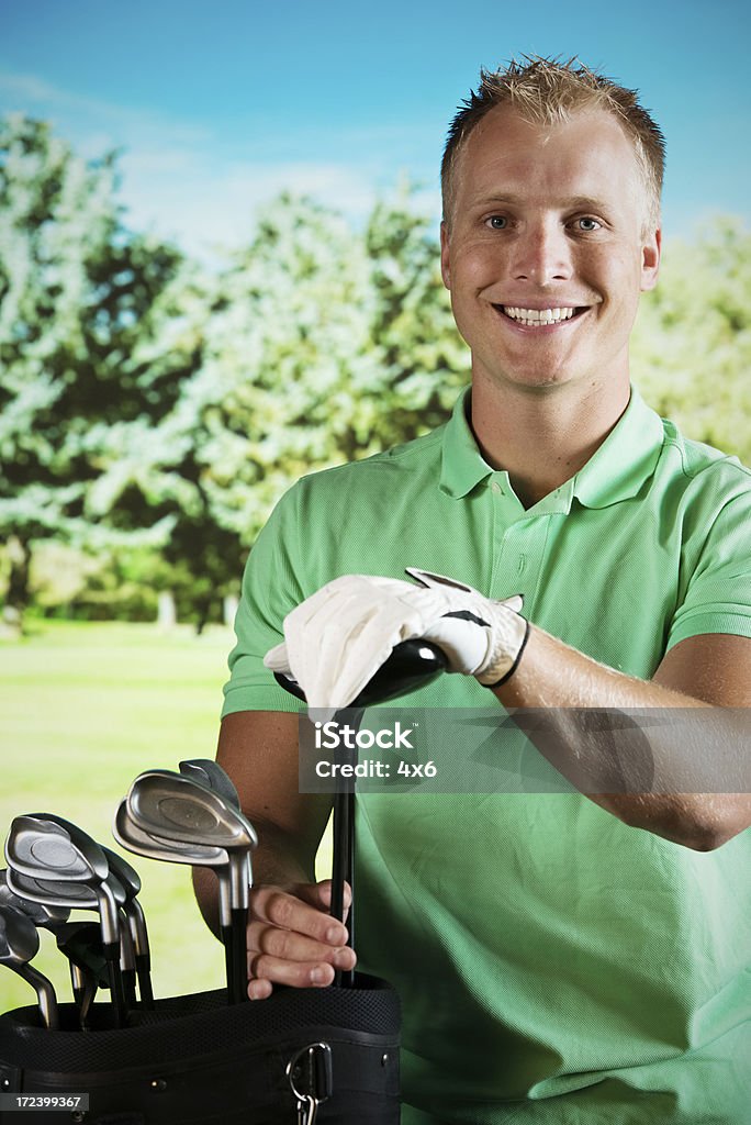 Portrait of a golfer smiling 20-29 Years Stock Photo