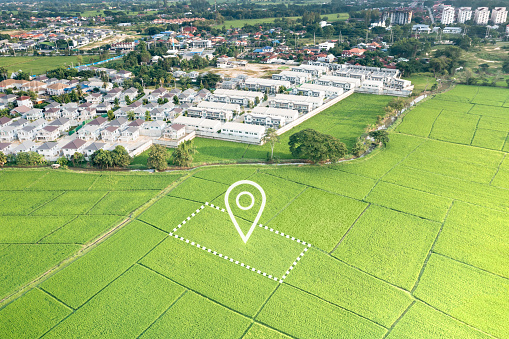 Land plot in aerial view. Identify registration symbol of vacant area for map. Real estate or property for business of home, house or residential i.e. development, sale, rent, buy or purchase.