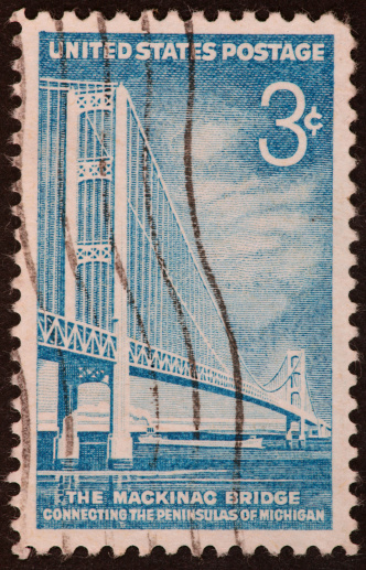 1957 postage stamp commemorating the Mackinac suspension bridge in Michigan.