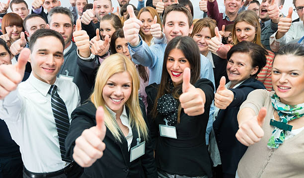 istock Business people holding their thumbs up. 172400265
