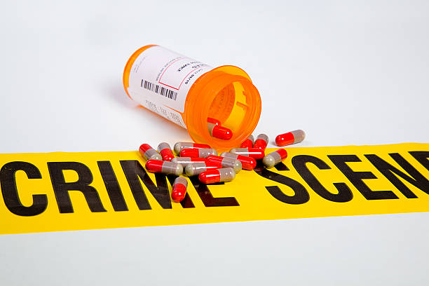 薬びん、薬、犯罪シーンのテープ - crime medicine narcotic rx ストックフォトと画像