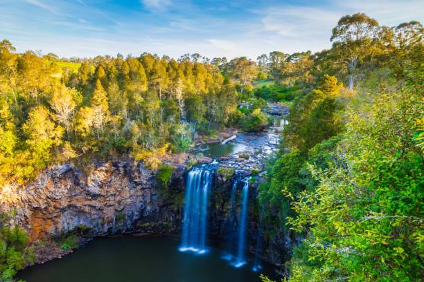 This captivating natural setting showcases a tranquil rock pool, enveloped by vibrant vegetation and scenic beauty in South Africa.