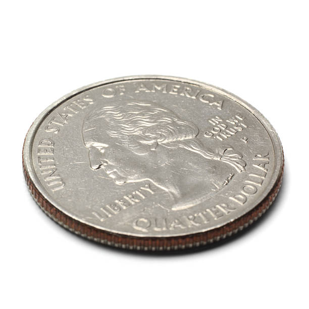 US Quarter Coin "Macro shot and tilted view of a US dollar quarter coin, head side, isolated on white background." quarter stock pictures, royalty-free photos & images