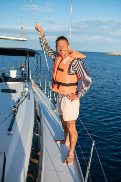 istock Man on a yacht smiling and feeling peaceful 1724017205