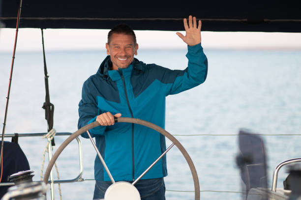 istock Smiling mature man sailing a ship 1724017216