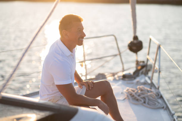 istock Well-built man in white tshirt on the yacht 1724017268