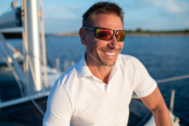istock Short-haired confident mature man sailing on a yacht 1724017281