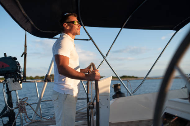 istock Short-haired confident mature man sailing on a yacht 1724017287