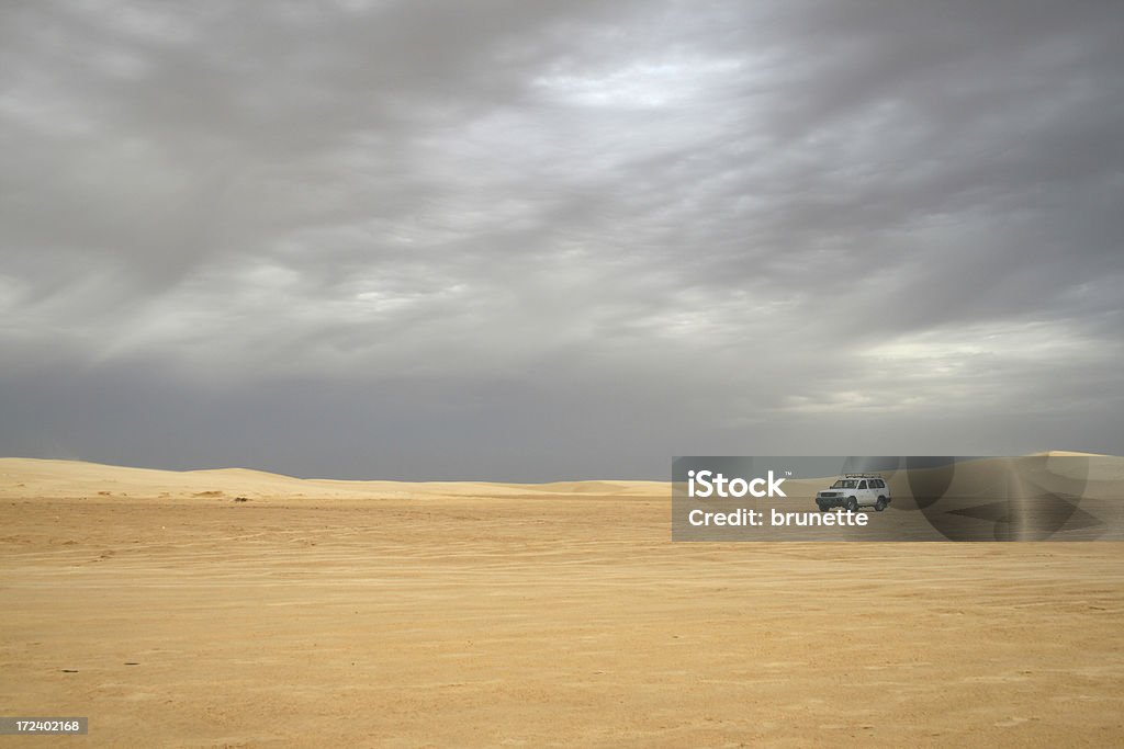 Sahara safari jeep Land cruiser in sea of sand 4x4 Stock Photo