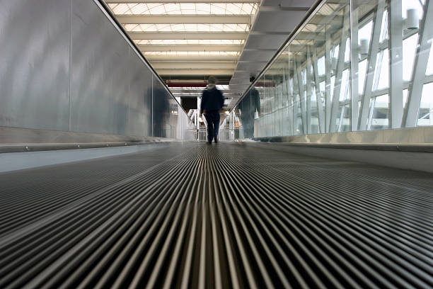 airport : travelling on the conveyor stock photo