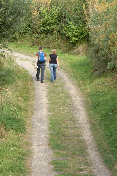 istock Young couple on country track 172402591
