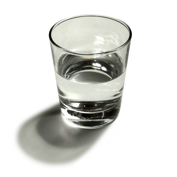 Half empty glass of water with clipping path