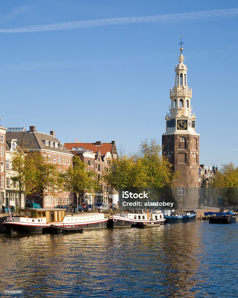 Amsterdam: Munttoren (tower)  in Centrum Amsterdam: Munttoren (tower)  in Centrum, with leaves in fall colors. Amsterdam Stock Photo