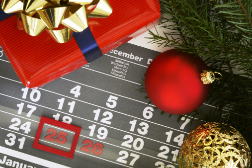 Christmas shown on a calendar. Focus on the calendar.