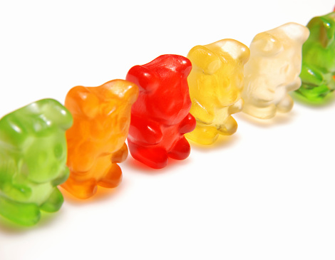 Colorful jelly gummy bears isolated on a white background. Vitamins for children.