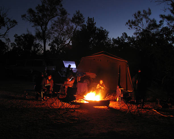Relaxing by Camp Fire stock photo