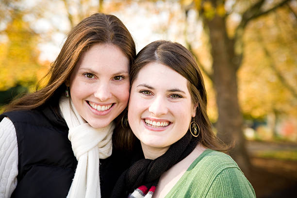 istock cute fall portrait of two girls 172404196