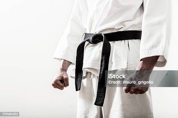 Up Close Of A Martial Arts Black Belt Worn On Ready Fighter Stock Photo - Download Image Now