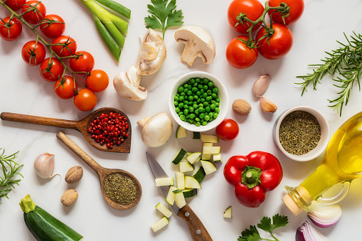 Seasoning: Fresh Herbs, Olive Oil, Garlic, Salt and Pepper Isolated on White Background